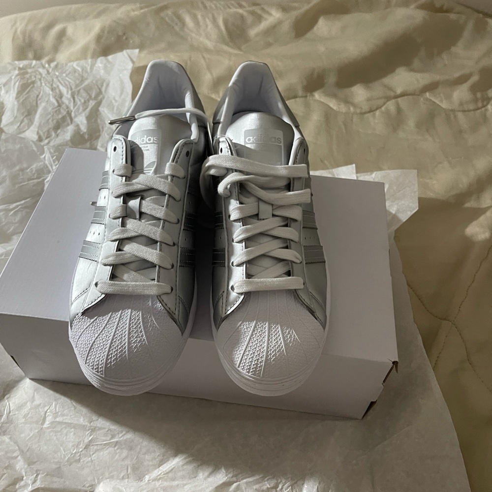 Brand new adidas with tag.